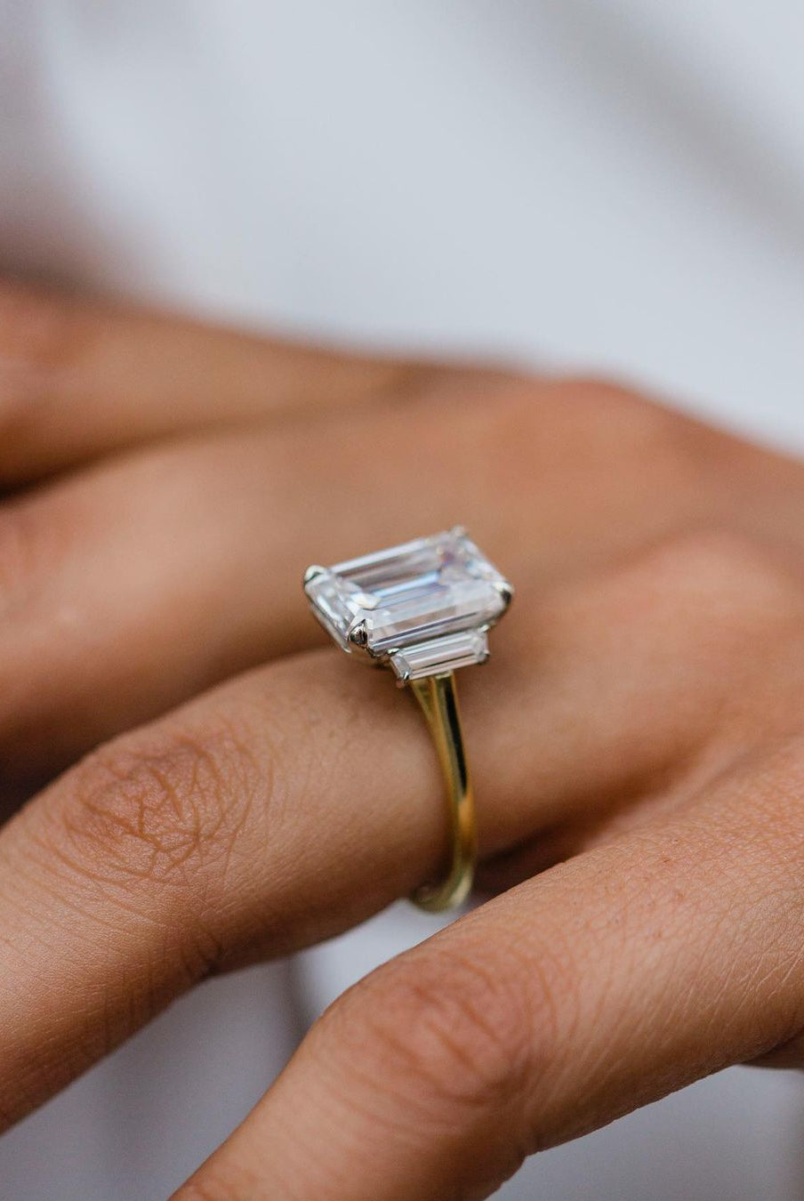 emerald-three-stone-moissanite-engagement-ring