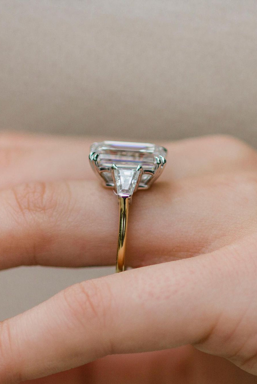 emerald-cut-three-stone-moissanite-engagement-ring