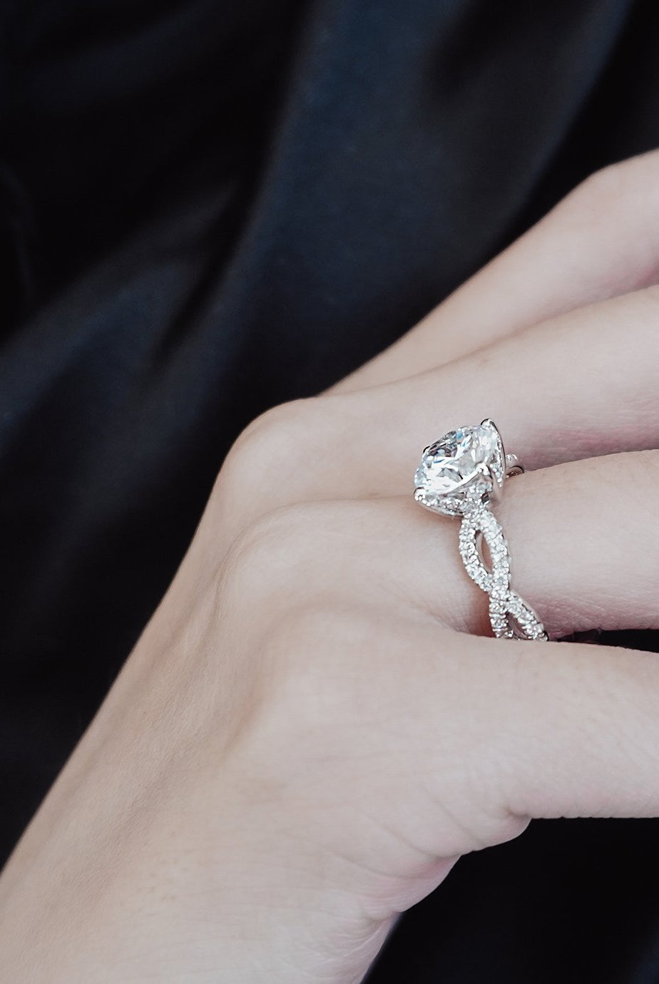 round-shaped-moissanite-solitaire-twisted-engagement-ring