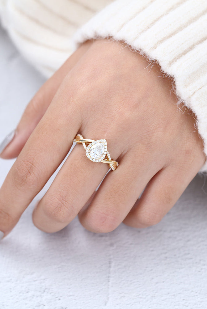 0-43-ct-pear-shaped-moissanite-halo-twisted-pave-engagement-ring