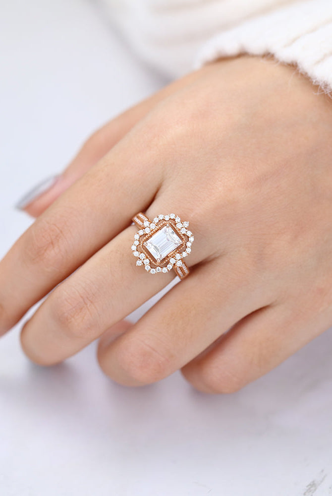 emerald-shaped-moissanite-cluster-halo-engagement-ring