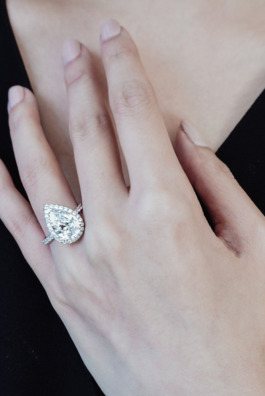 pear-shaped-moissanite-halo-engagement-ring
