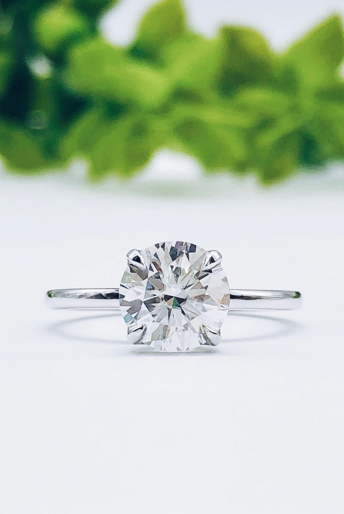round-cut-solitaire-moissanite-engagement-ring