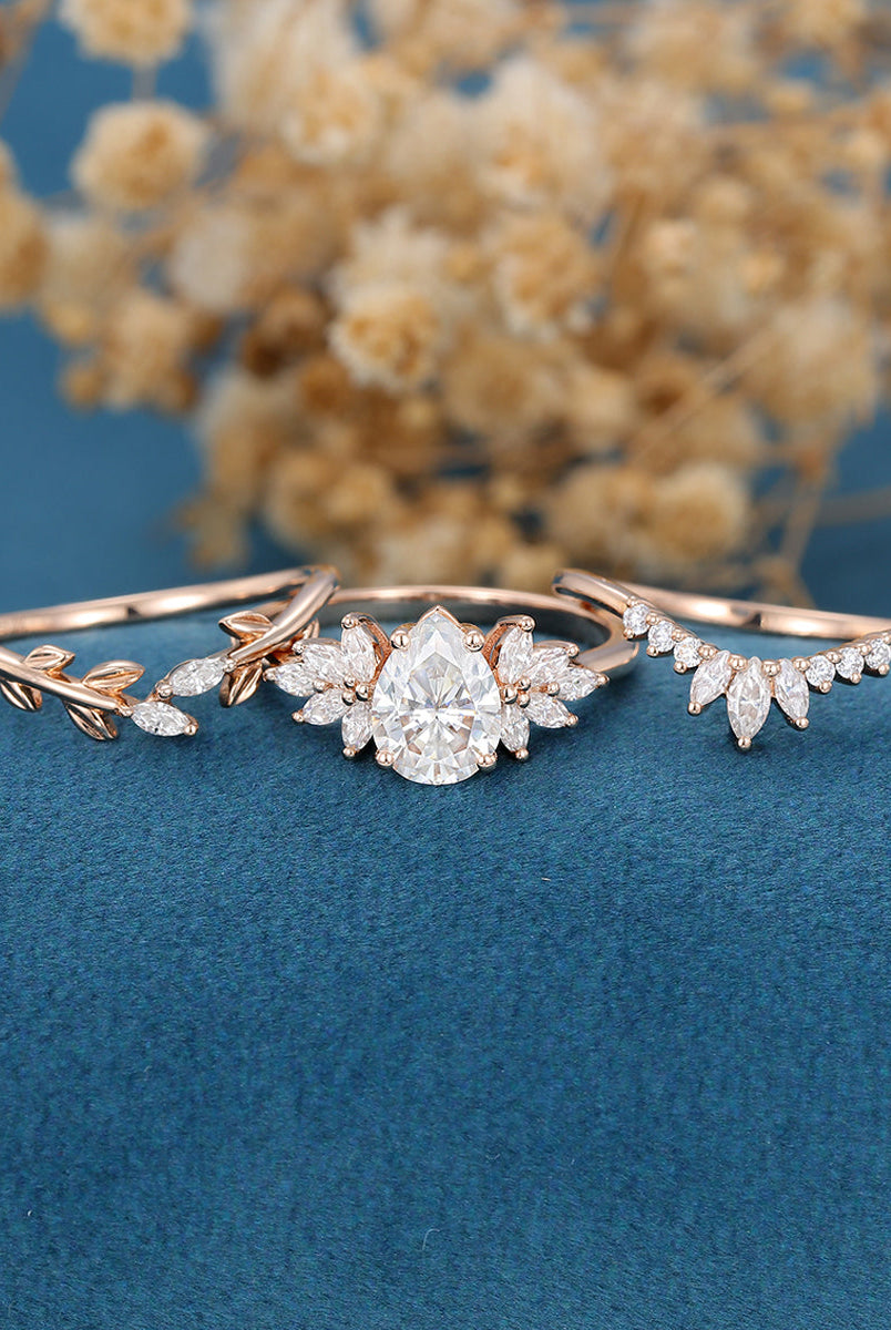 1-0-ct-pear-shaped-moissanite-cluster-bridal-set-6