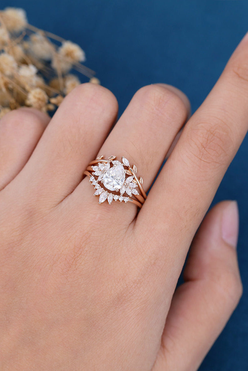 1-0-ct-pear-shaped-moissanite-cluster-bridal-set-6