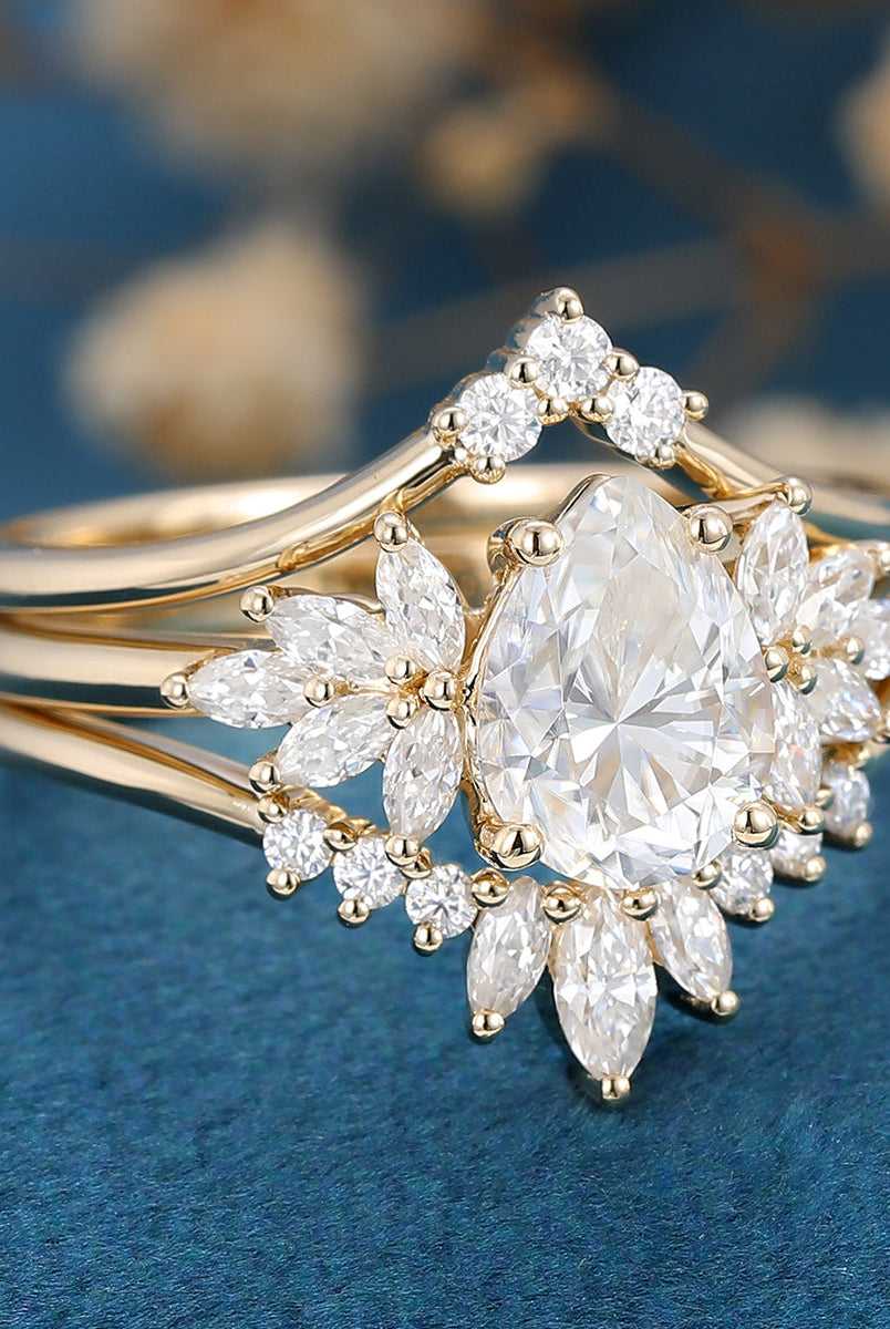 1-0-ct-pear-shaped-moissanite-cluster-bridal-set-3