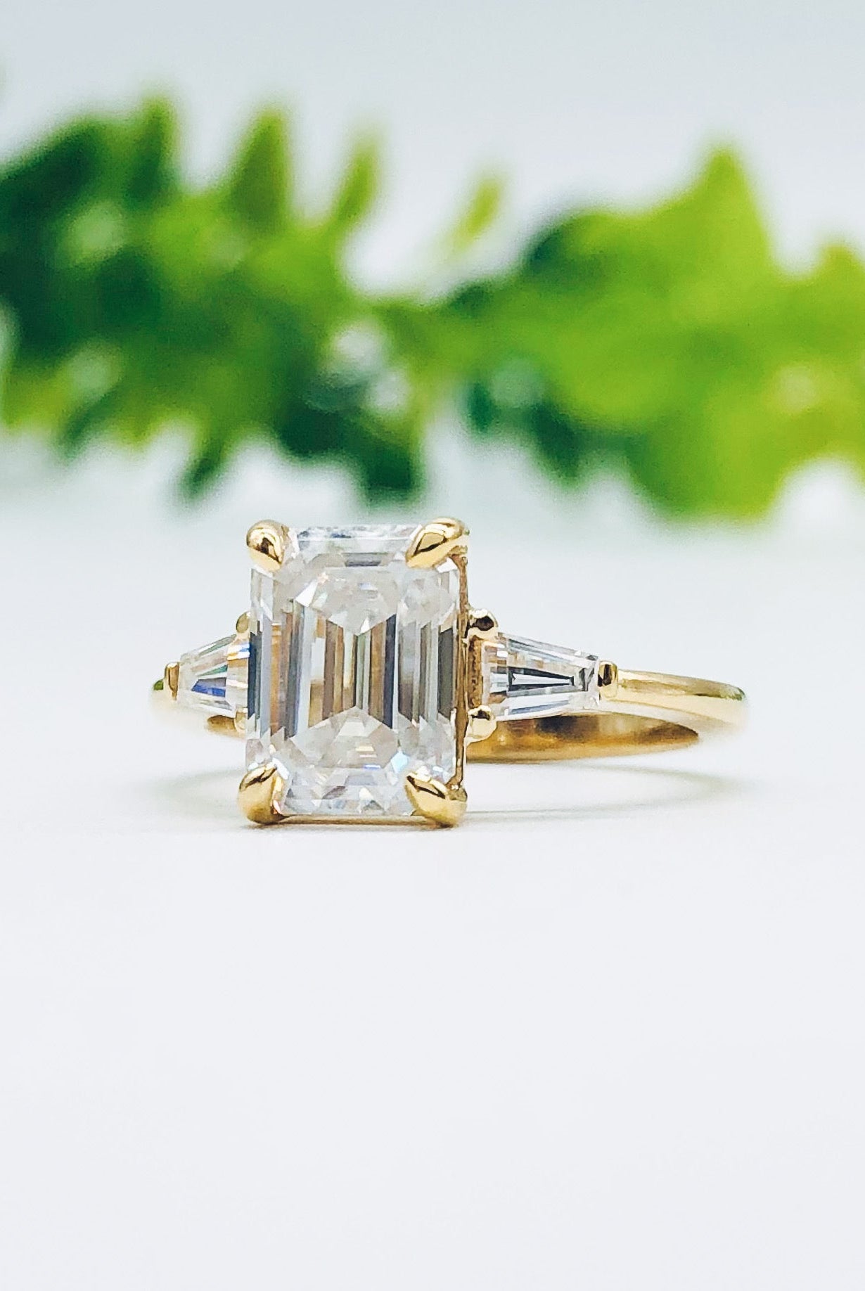 1-9-ct-emerald-cut-three-stone-moissanite-engagement-ring