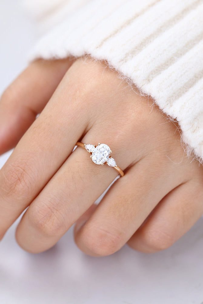 oval-shaped-moissanite-three-stone-engagement-ring