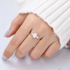 oval-shaped-moissanite-three-stone-engagement-ring