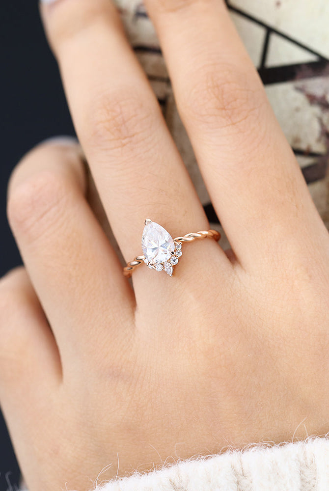 0-90-ct-pear-shaped-moissanite-cluster-engagement-ring