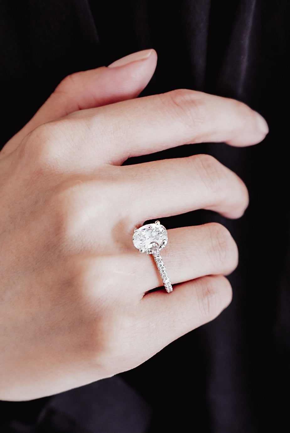 oval-shaped-moissanite-hidden-halo-engagement-ring