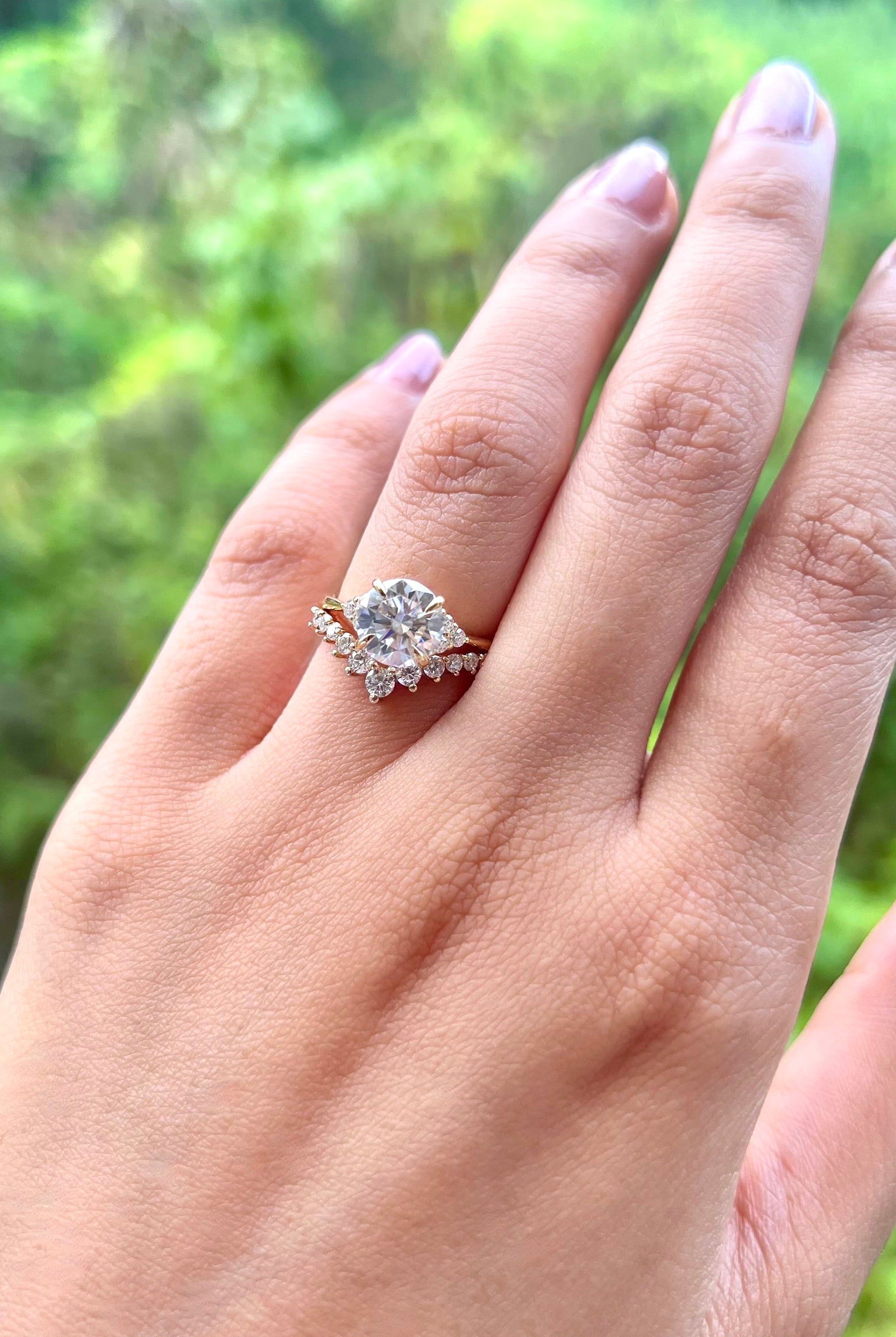 round-cut-cluster-moissanite-engagement-ring