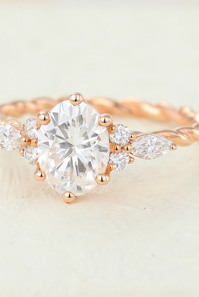 oval-shaped-moissanite-cluster-engagement-ring-16