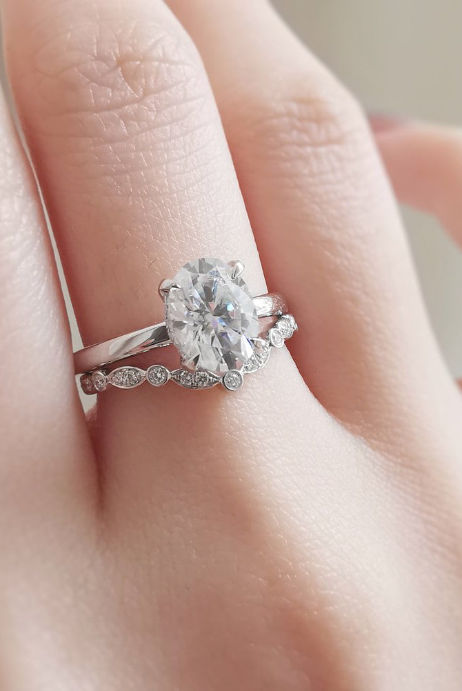1-50-ct-oval-shaped-moissanite-hidden-halo-engagement-ring