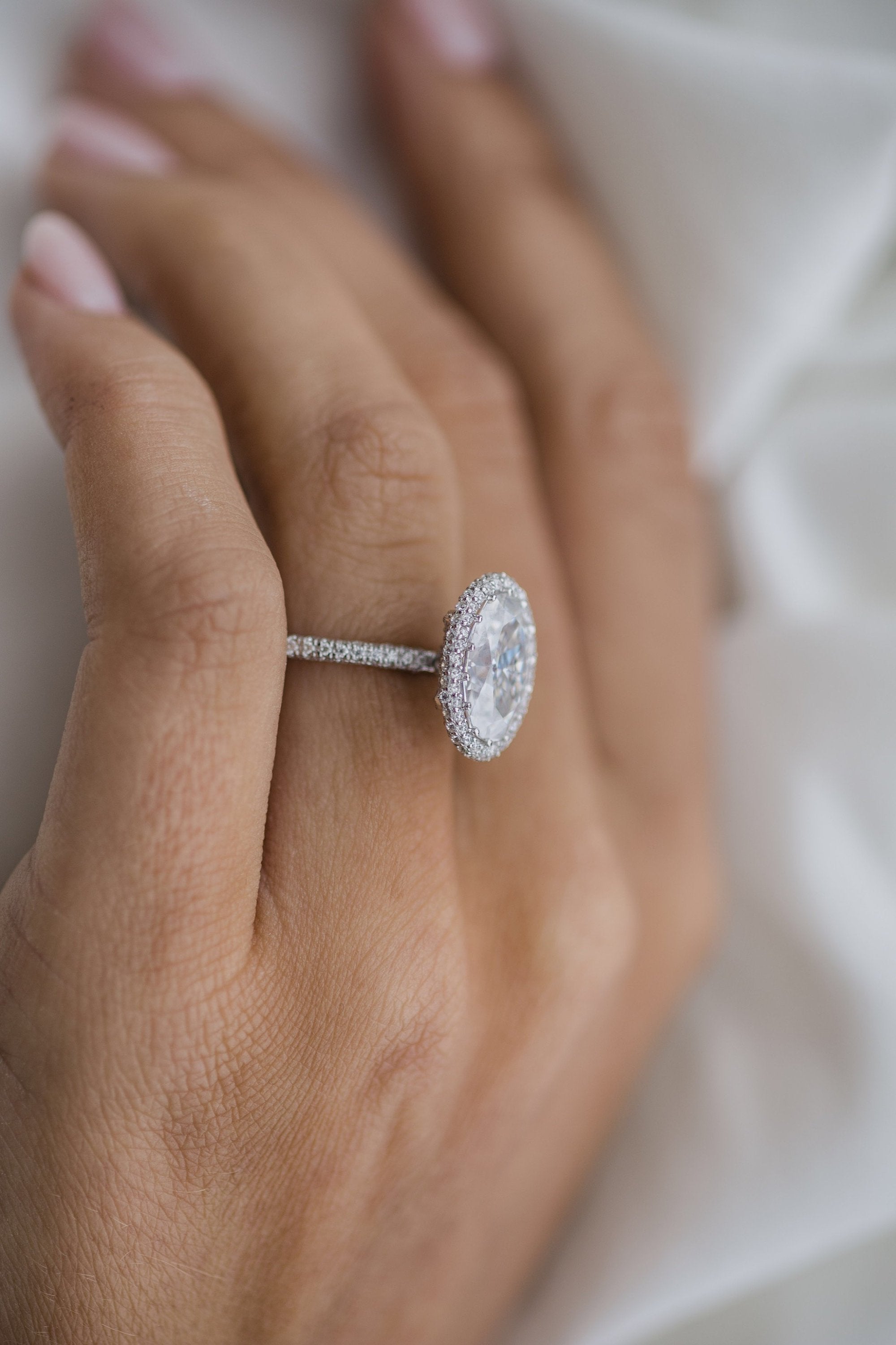 Delicate moissanite engagement rings