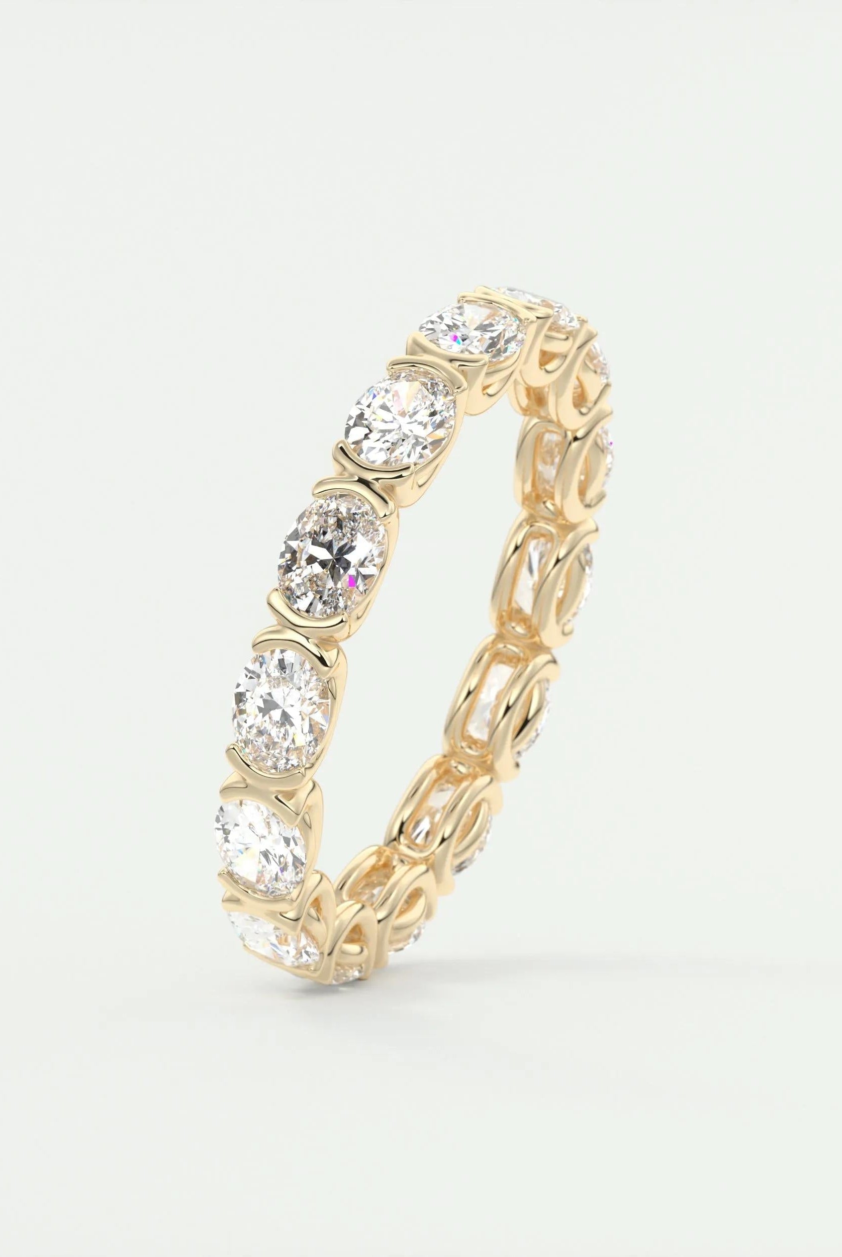 2-25-oval-cut-half-bezel-moissanite-bridal-wedding-band