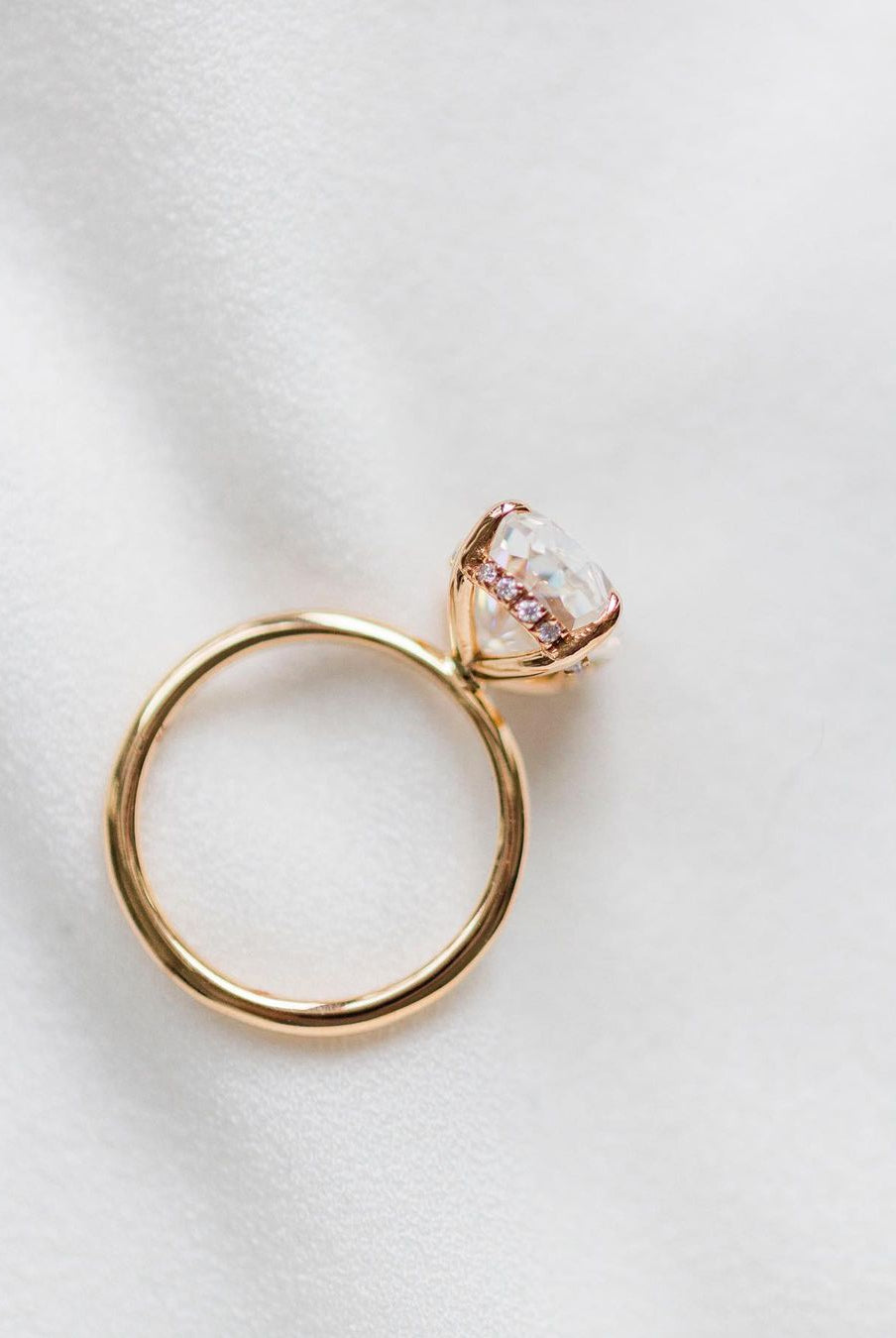 oval-cut-solitaire-hidden-halo-moissanite-engagement-ring