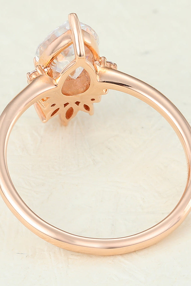 pear-shaped-moissanite-cluster-engagement-ring-2