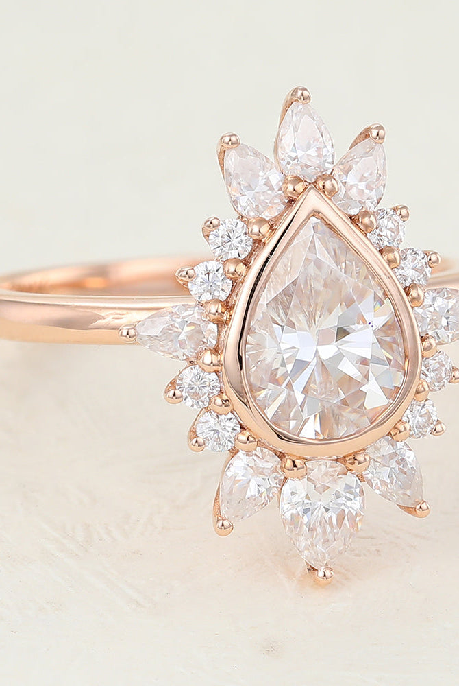 pear-shaped-moissanite-cluster-halo-engagement-ring