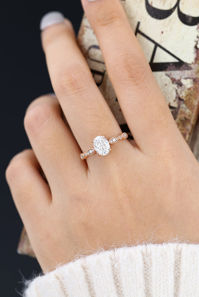oval-shaped-moissanite-milgrain-style-engagement-ring
