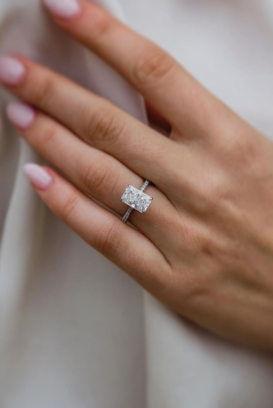 radiant-solitaire-hidden-halo-moissanite-engagement-ring