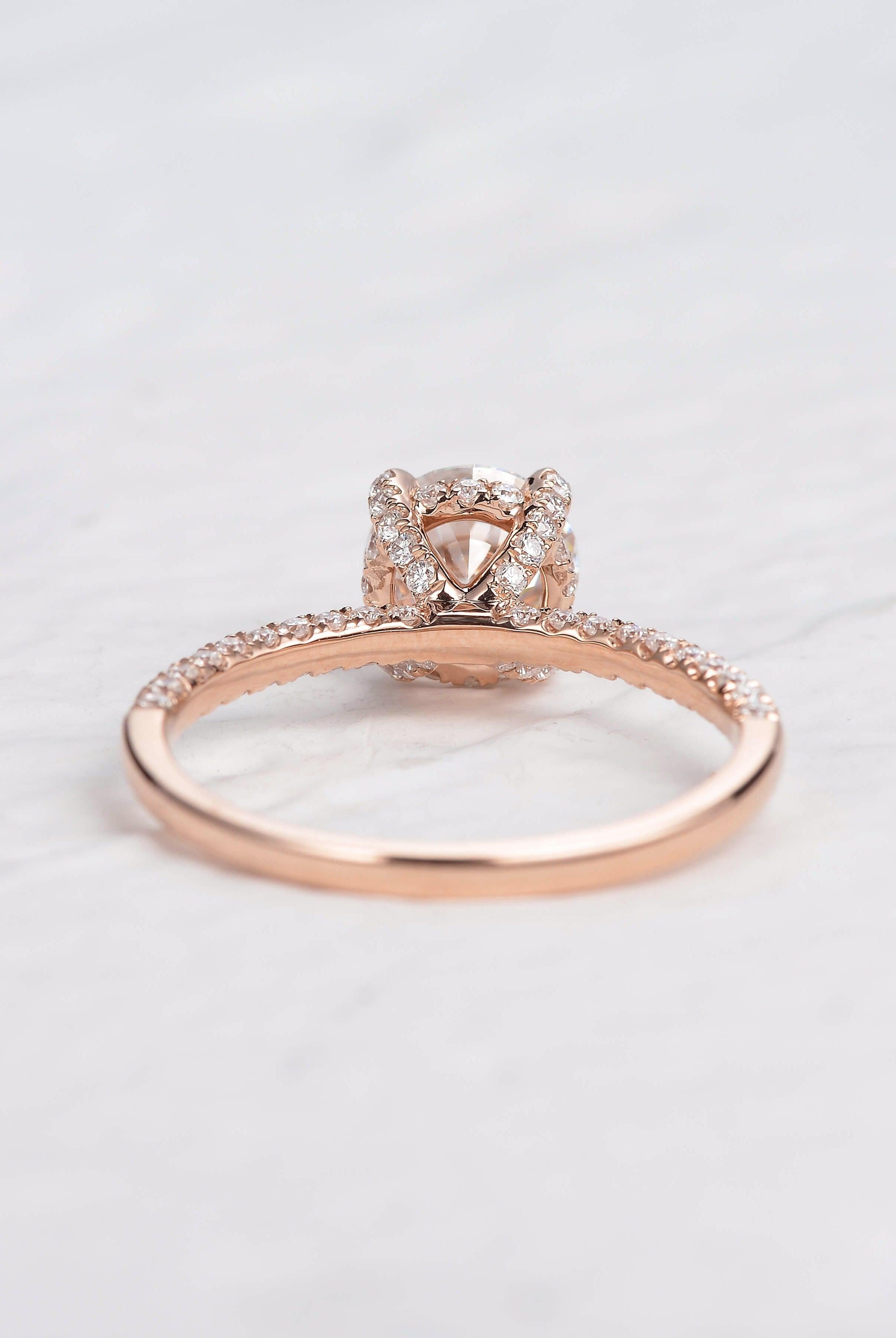 round-cut-solitaire-pave-moissanite-engagement-ring