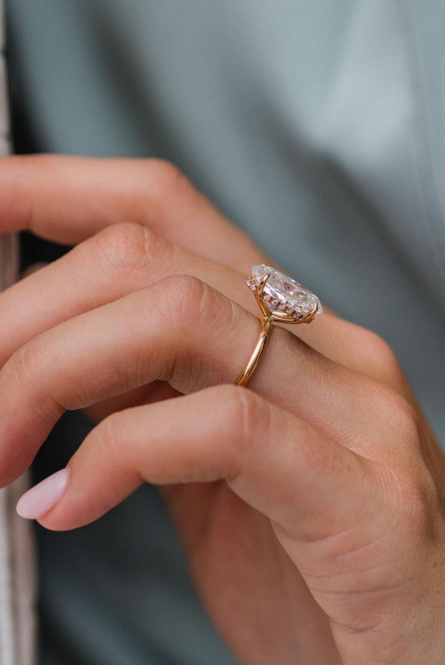 oval-cut-solitaire-hidden-halo-moissanite-engagement-ring