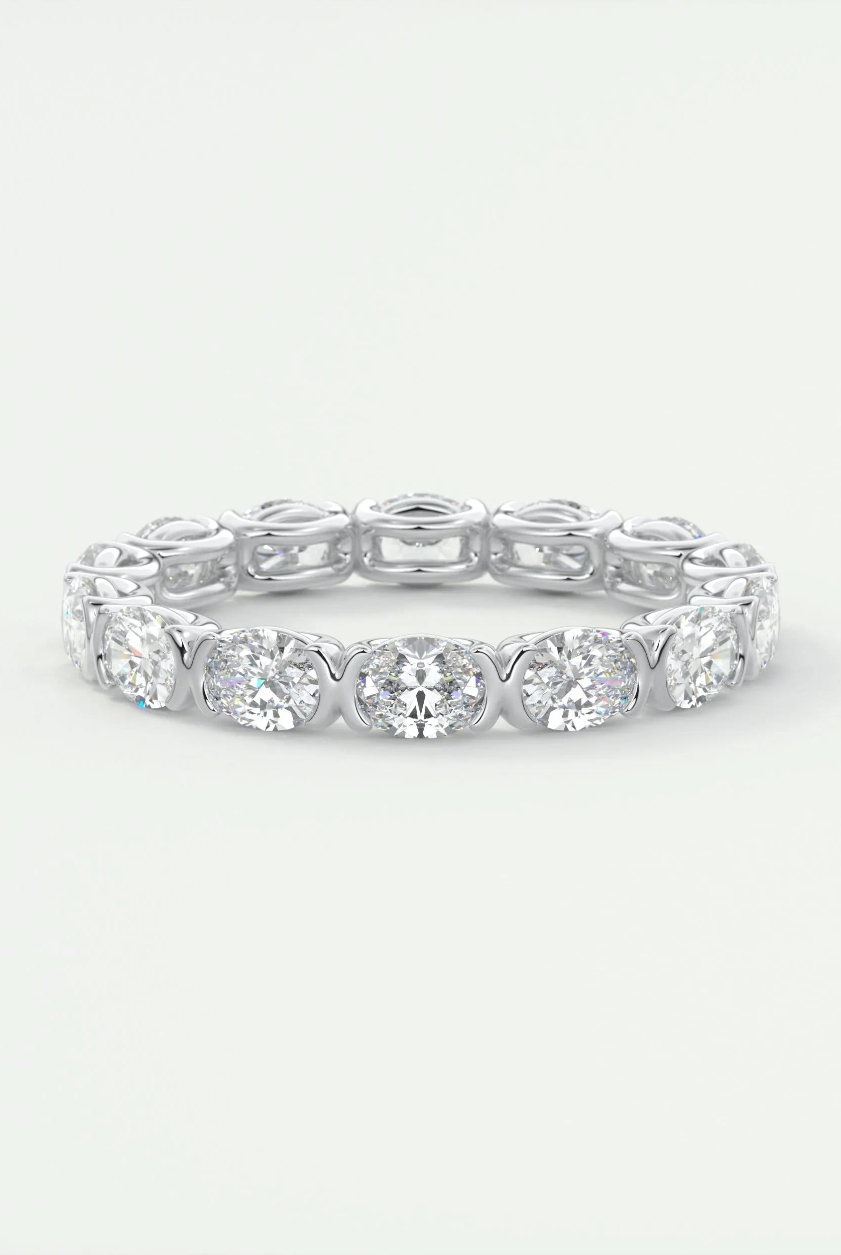 2-25-oval-cut-half-bezel-moissanite-bridal-wedding-band