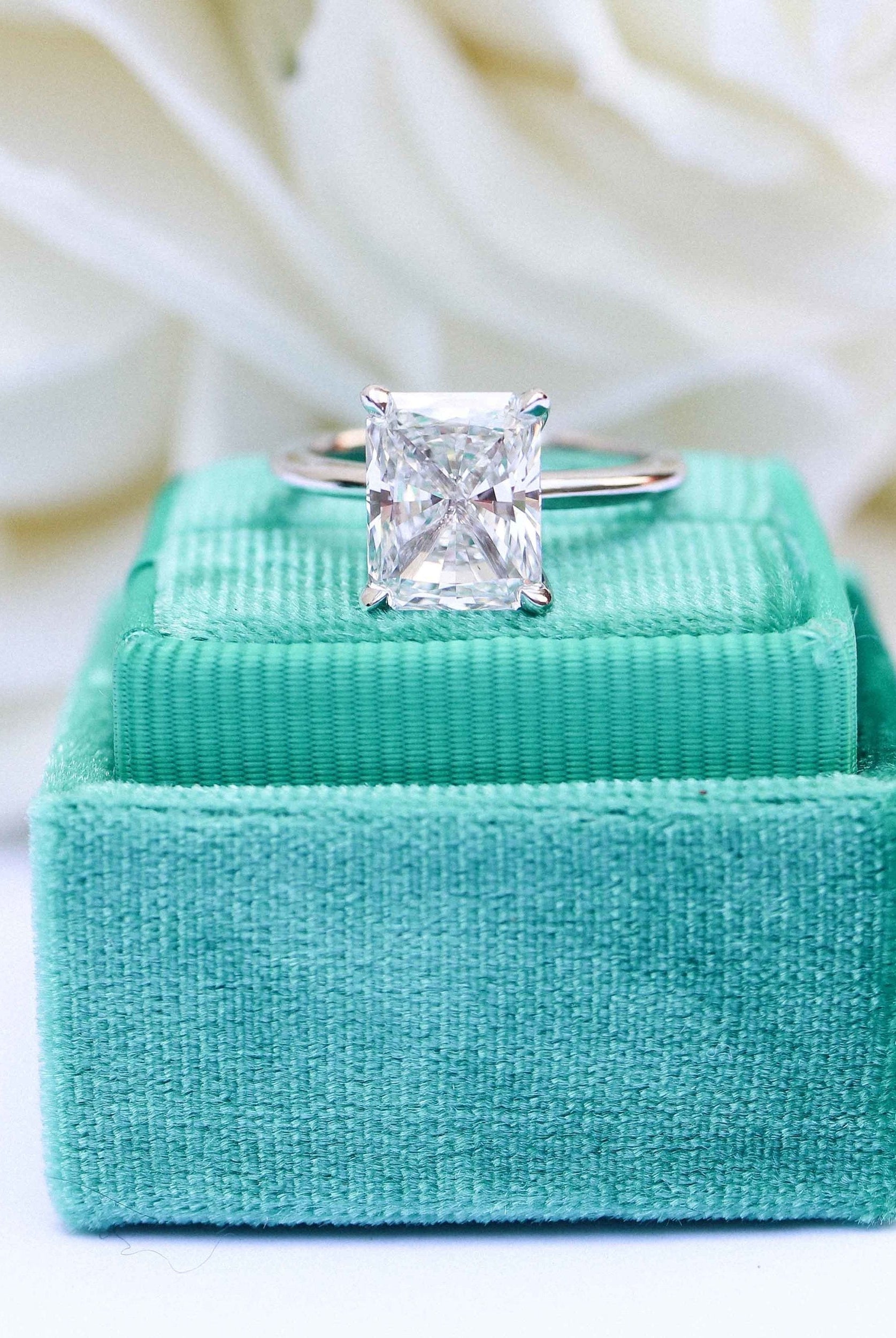 Moissanite twist trilogy ring New York