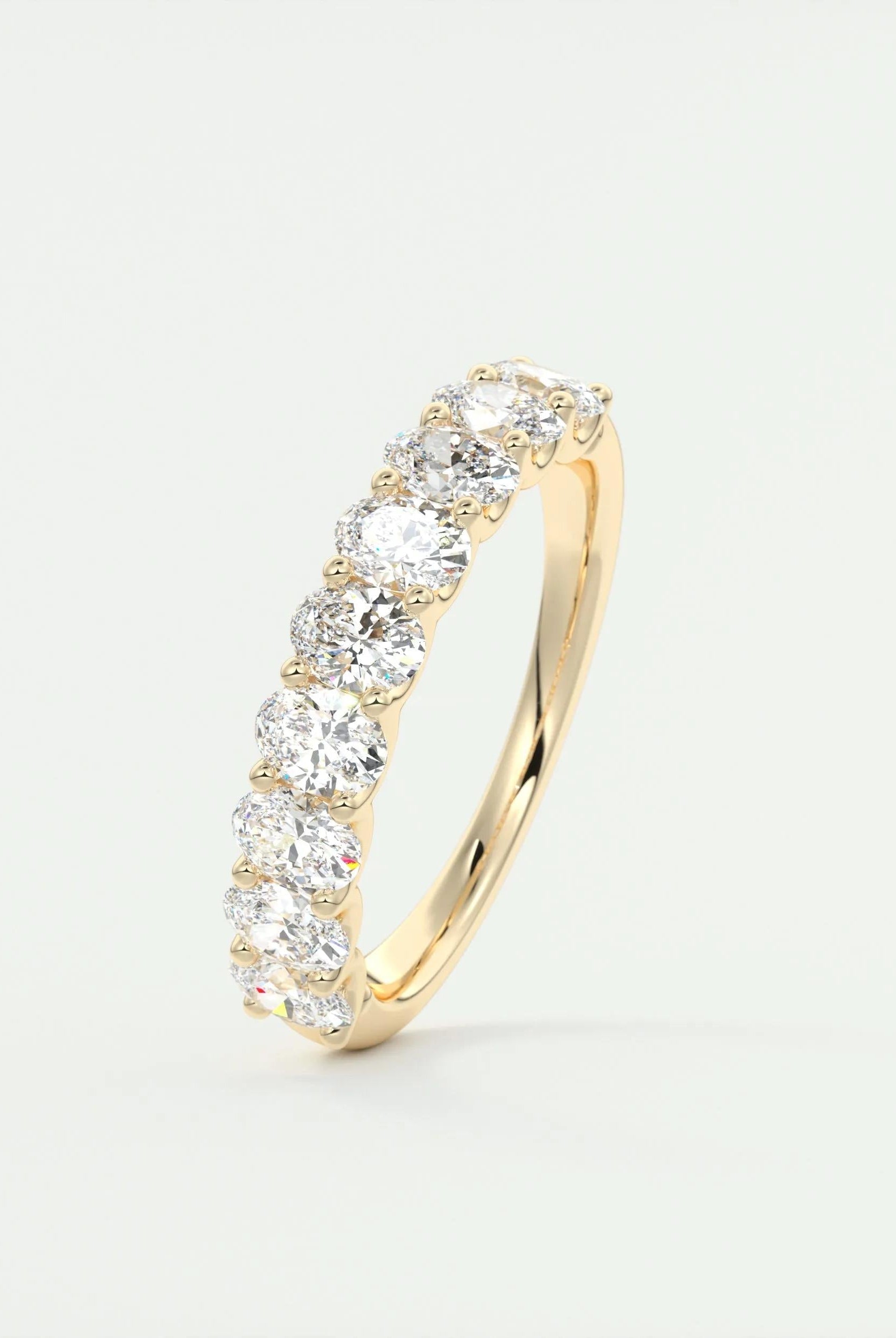 1-35-oval-cut-shared-prongs-moissanite-bridal-wedding-band