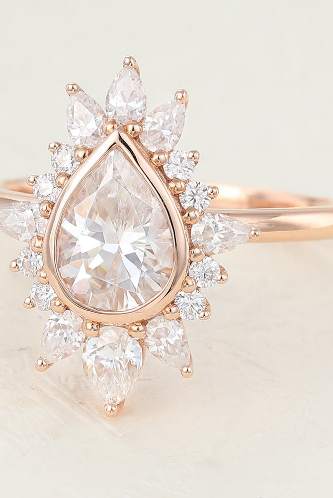 0-57-ct-pear-shaped-moissanite-cluster-halo-engagement-ring