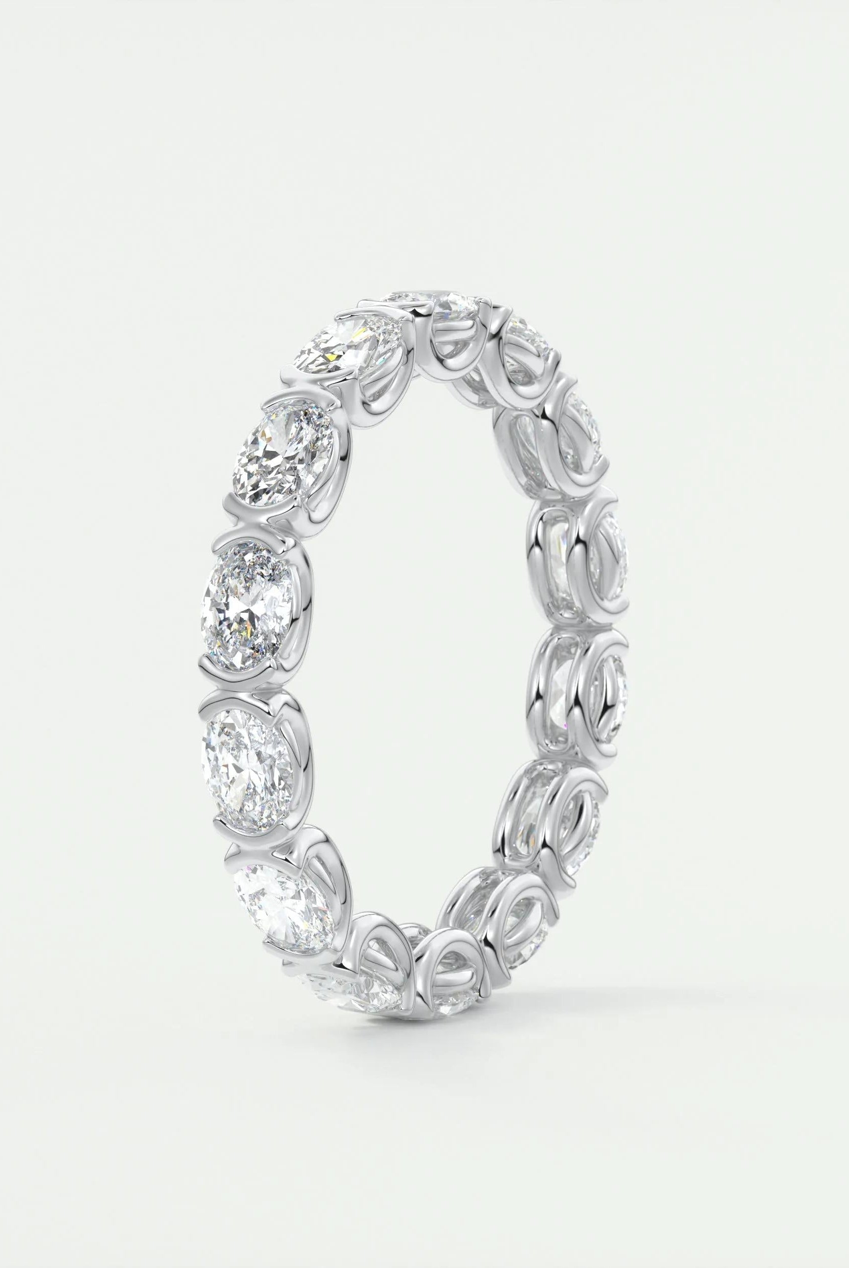 2-25-oval-cut-half-bezel-moissanite-bridal-wedding-band