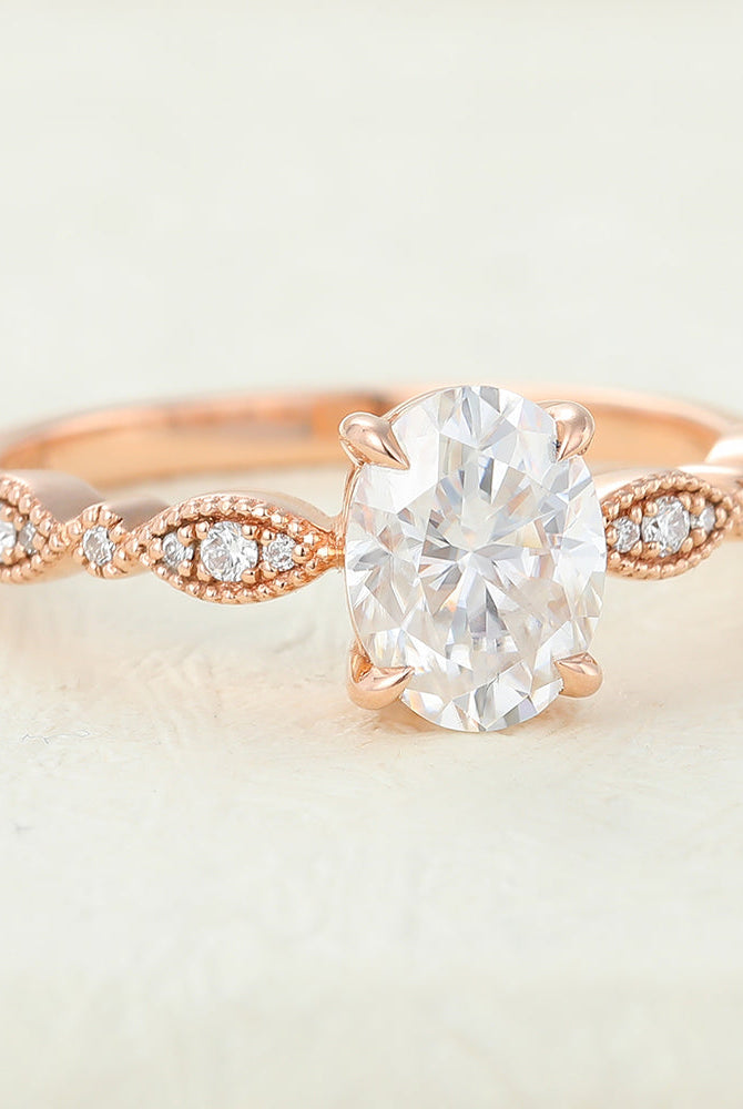 oval-shaped-moissanite-milgrain-style-engagement-ring