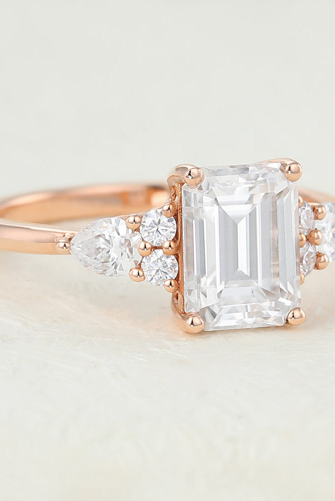 emerald-shaped-moissanite-cluster-engagement-ring