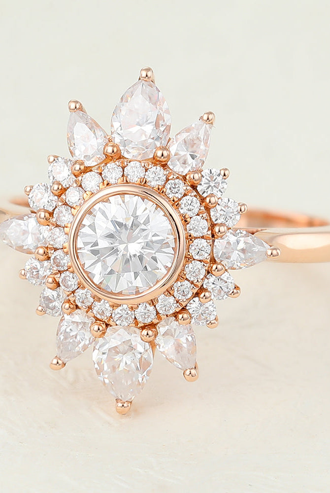 round-shaped-moissanite-cluster-halo-engagement-ring