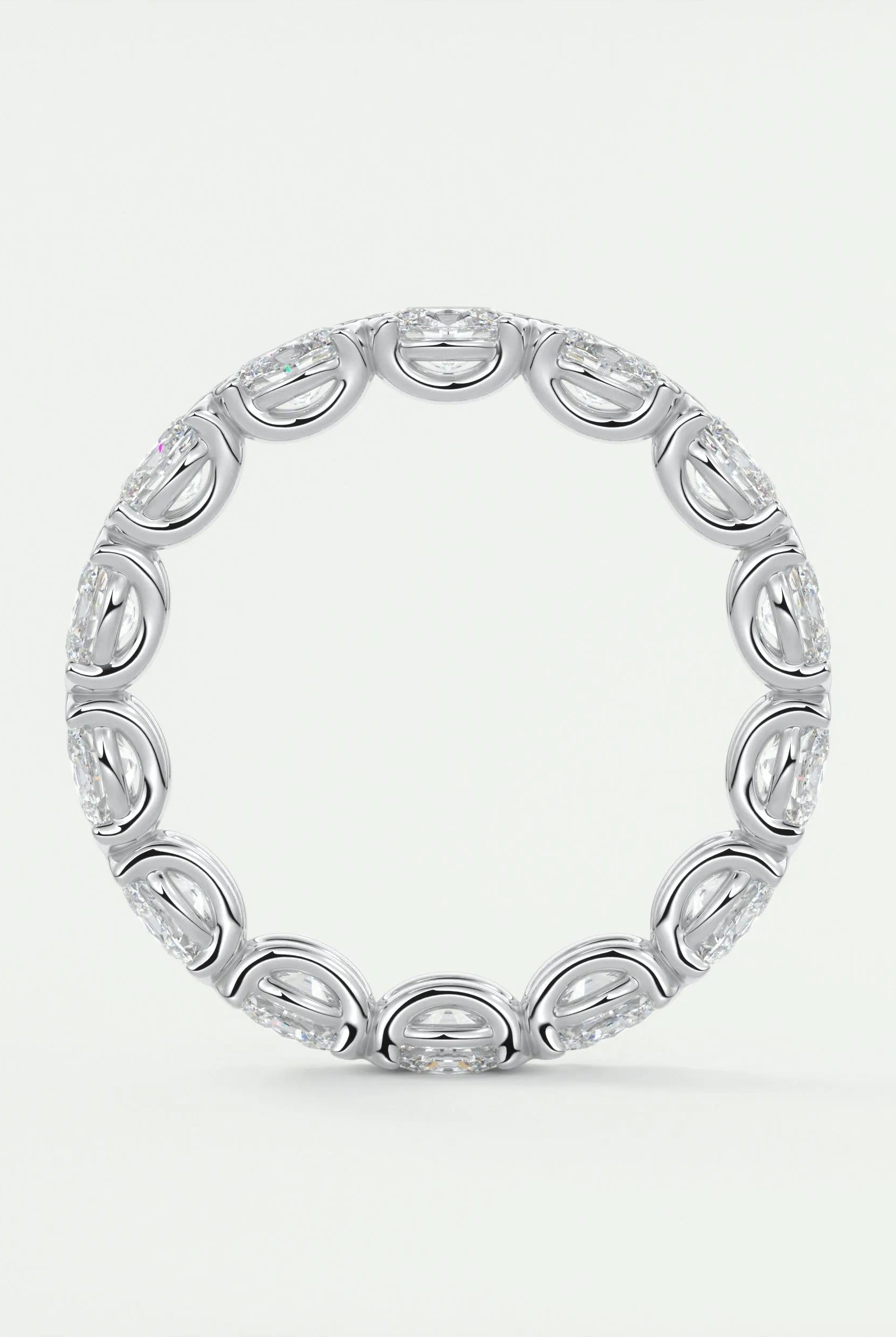 oval-cut-half-bezel-moissanite-bridal-wedding-band