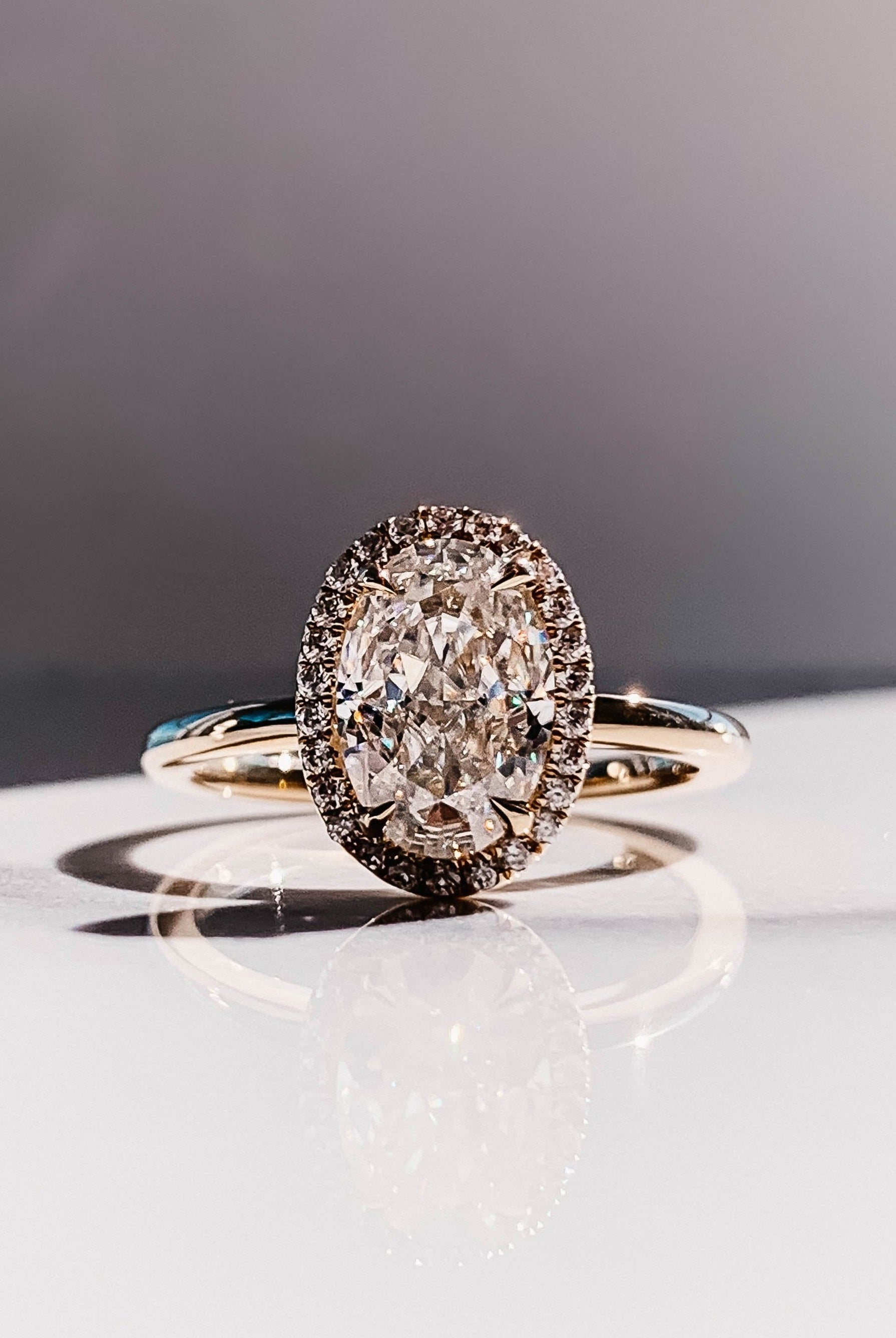 2.0CT Oval Four Prong Moissanite Diamond Halo Engagement Ring In 18K Yellow Gold