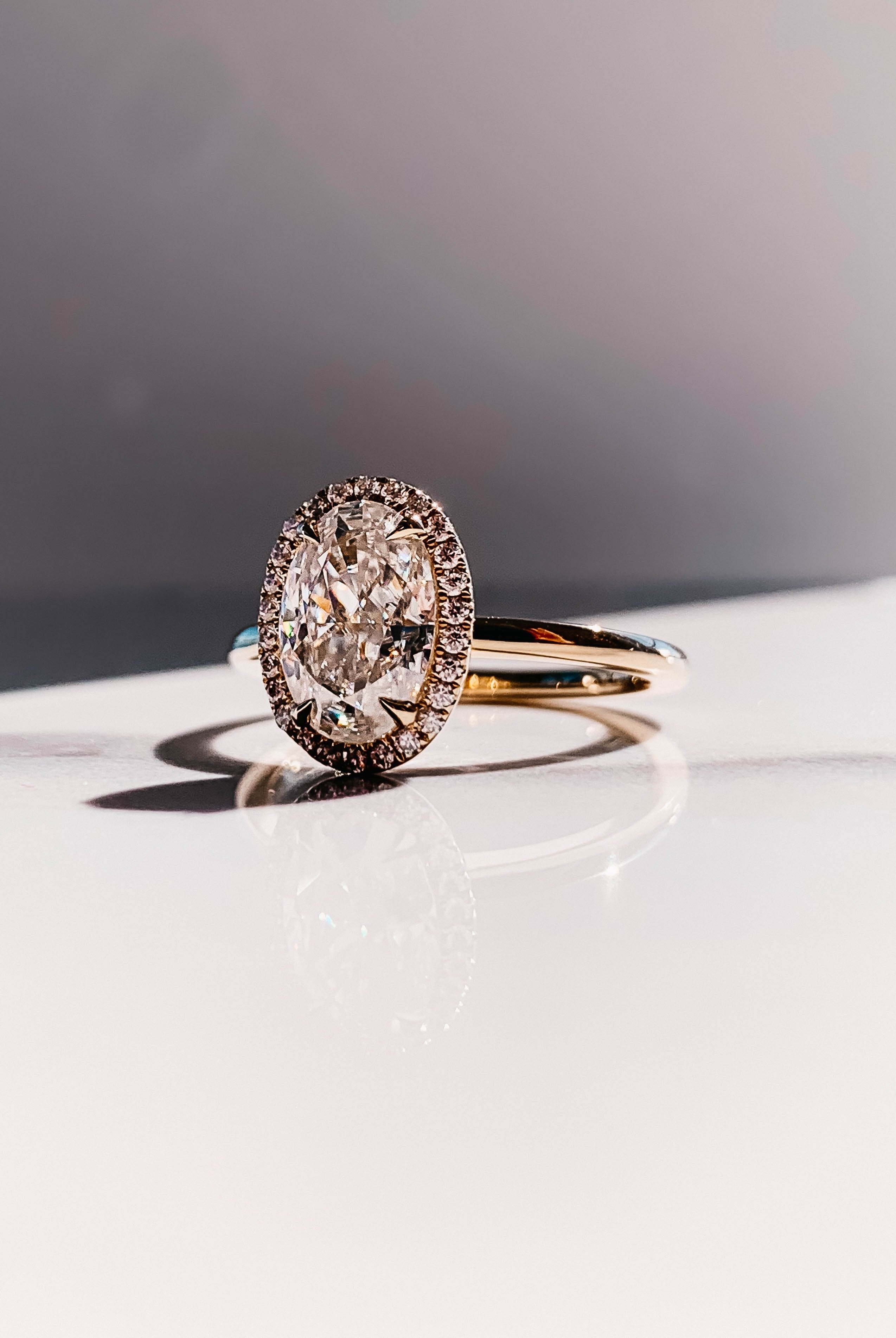 2.0CT Oval Four Prong Moissanite Diamond Halo Engagement Ring In 18K Yellow Gold