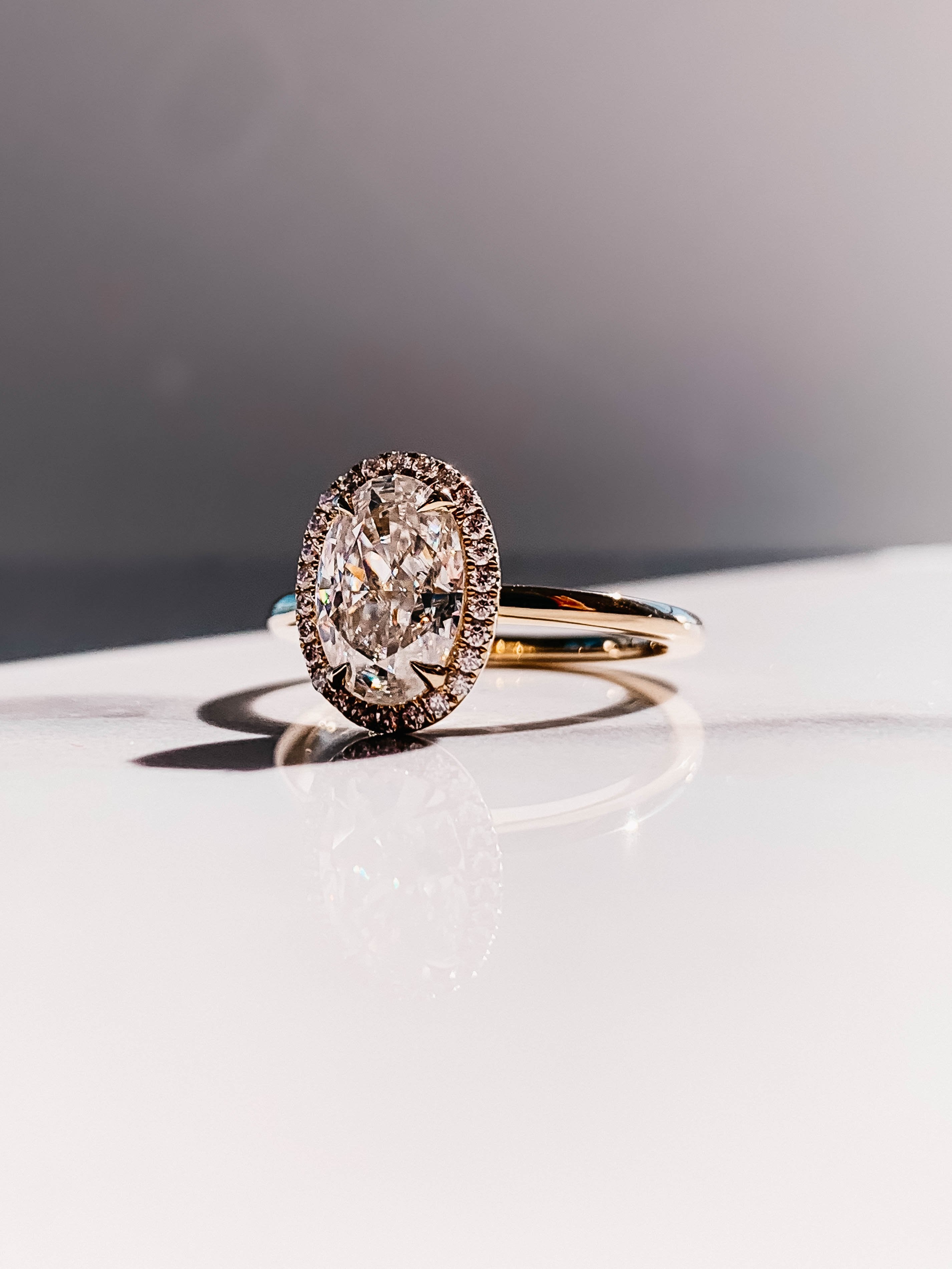 2.0CT Oval Four Prong Moissanite Diamond Halo Engagement Ring In 18K Yellow Gold