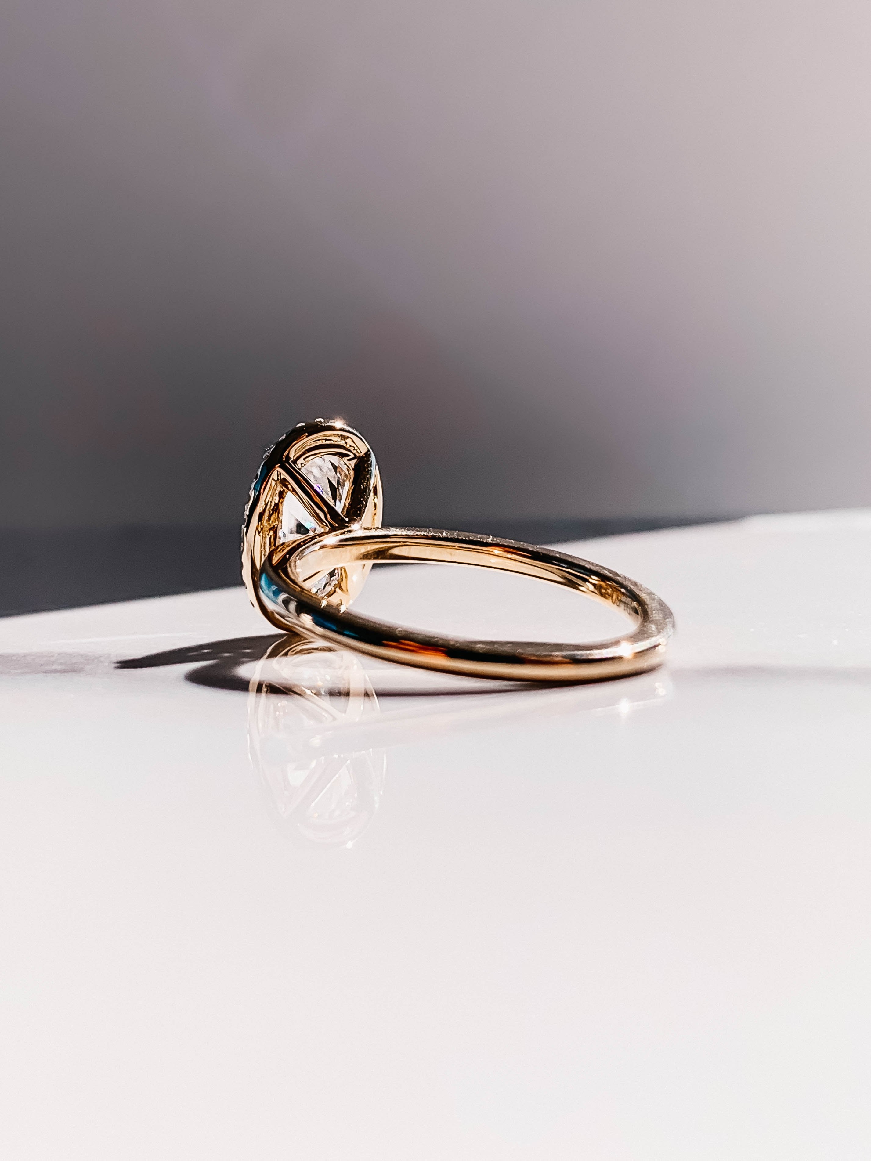 2.0CT Oval Four Prong Moissanite Diamond Halo Engagement Ring In 18K Yellow Gold