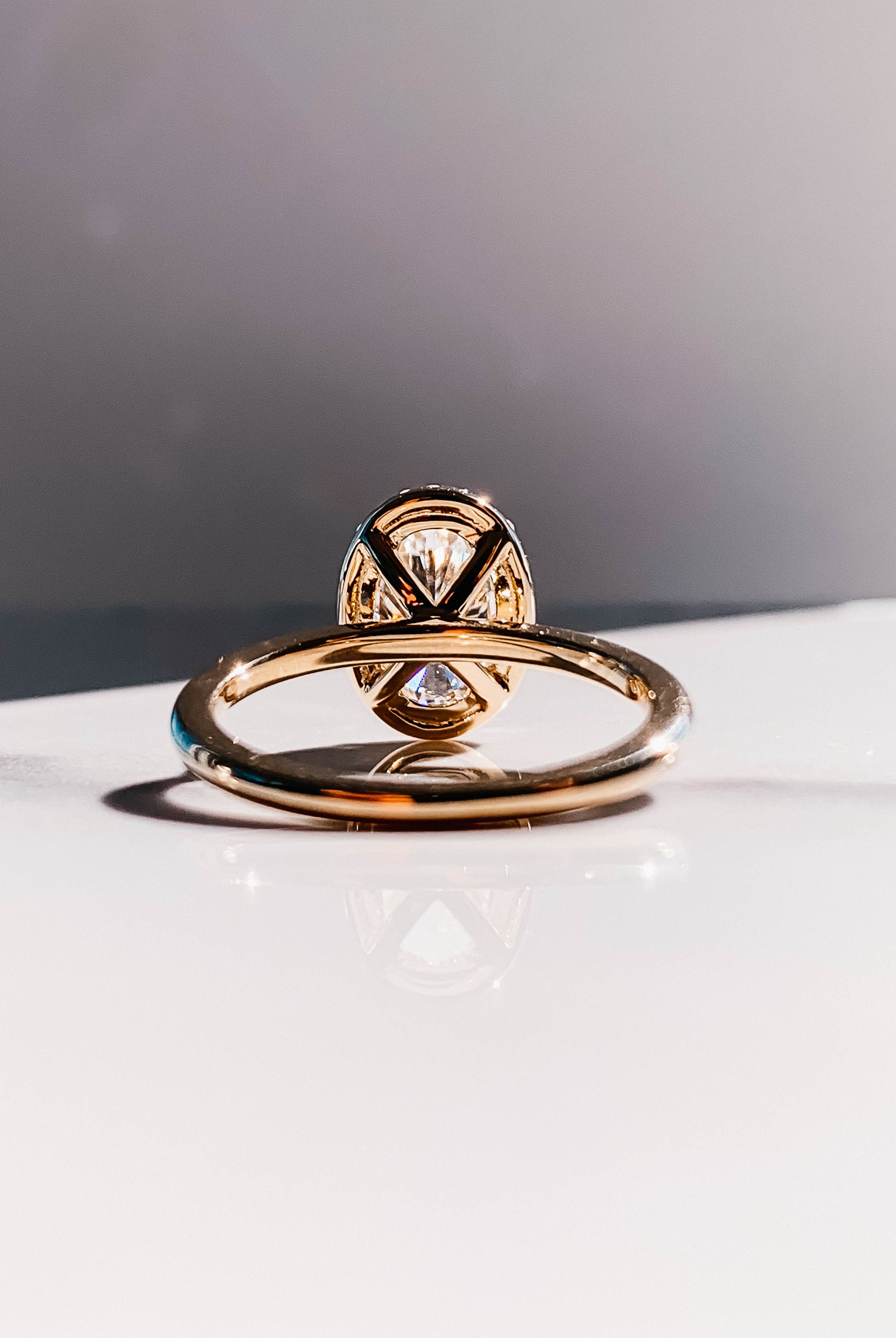 2.0CT Oval Four Prong Moissanite Diamond Halo Engagement Ring In 18K Yellow Gold