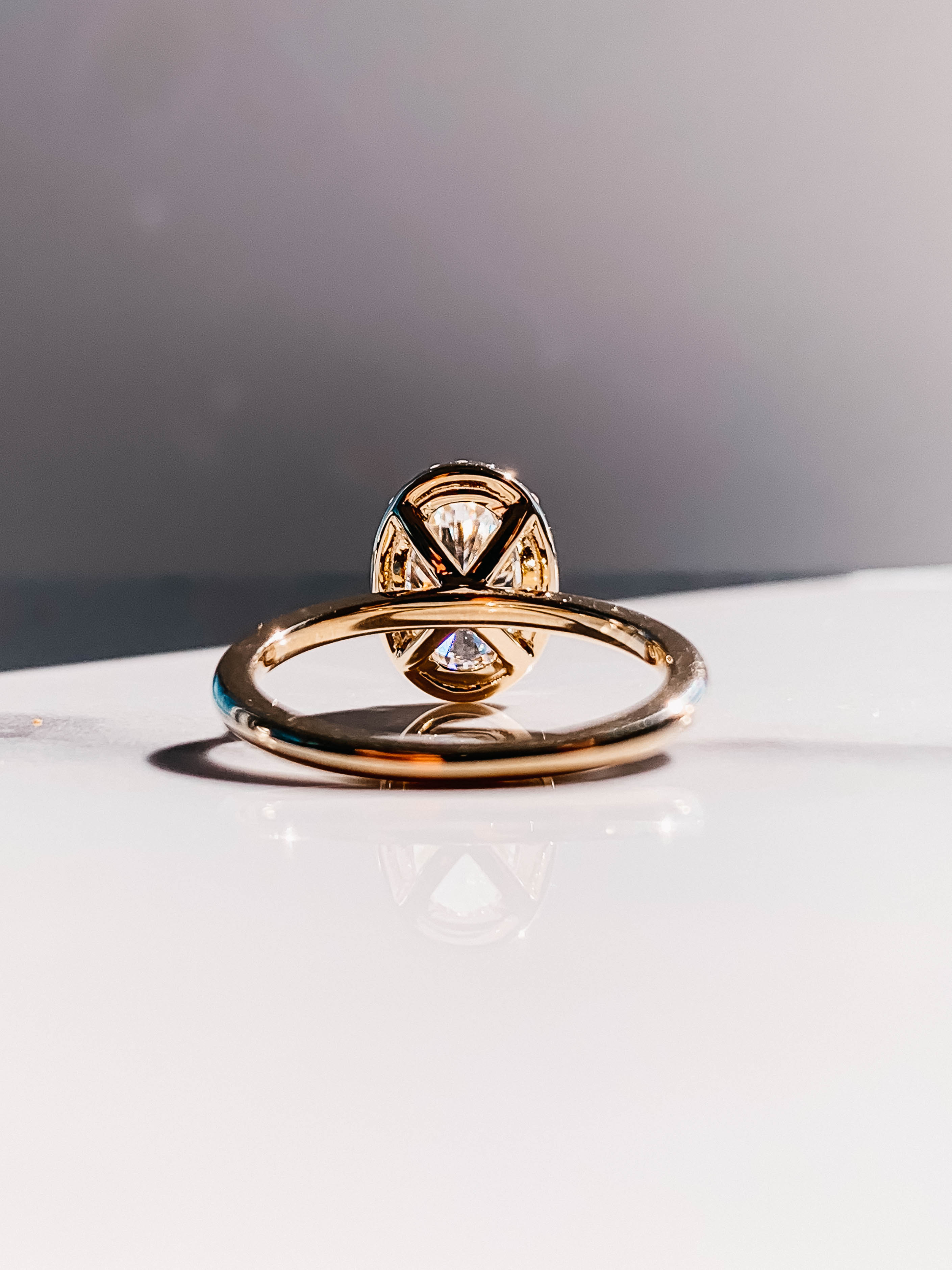 2.0CT Oval Four Prong Moissanite Diamond Halo Engagement Ring In 18K Yellow Gold