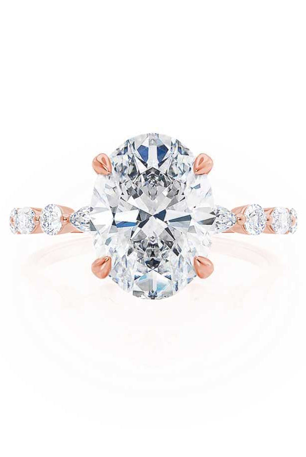 oval-shaped-moissanite-solitaire-with-pave-setting-engagement-ring