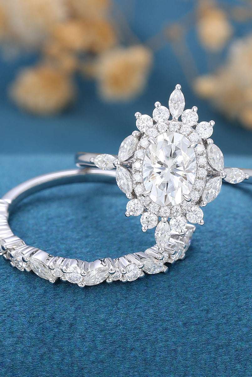 0-84-ct-oval-shaped-moissanite-cluster-halo-bridal-set