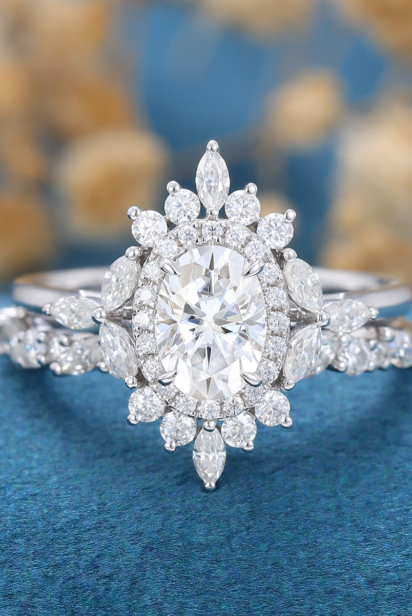 oval-shaped-moissanite-cluster-halo-bridal-set