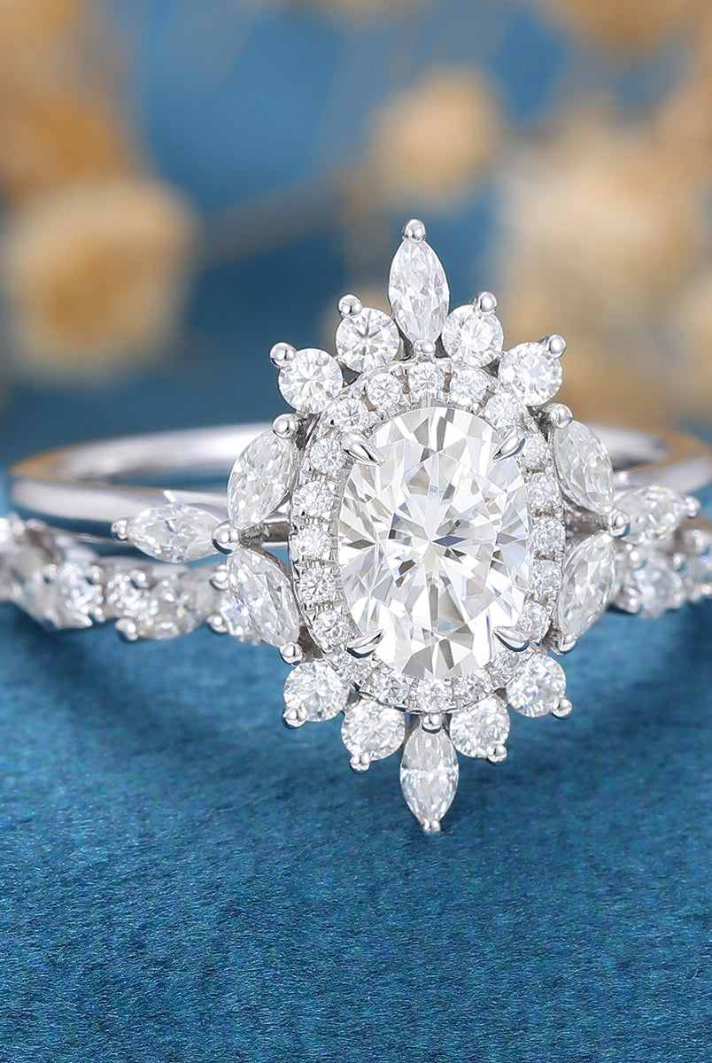 oval-shaped-moissanite-cluster-halo-bridal-set