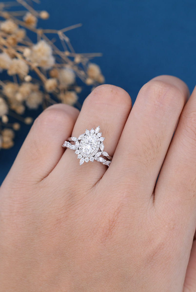 0-84-ct-oval-shaped-moissanite-cluster-halo-bridal-set