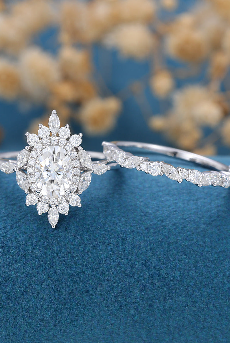 oval-shaped-moissanite-cluster-halo-bridal-set