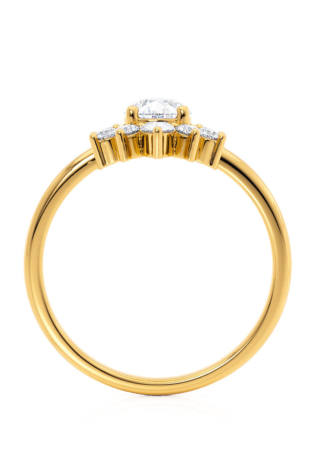 pear-shaped-moissanite-cluster-style-engagement-ring
