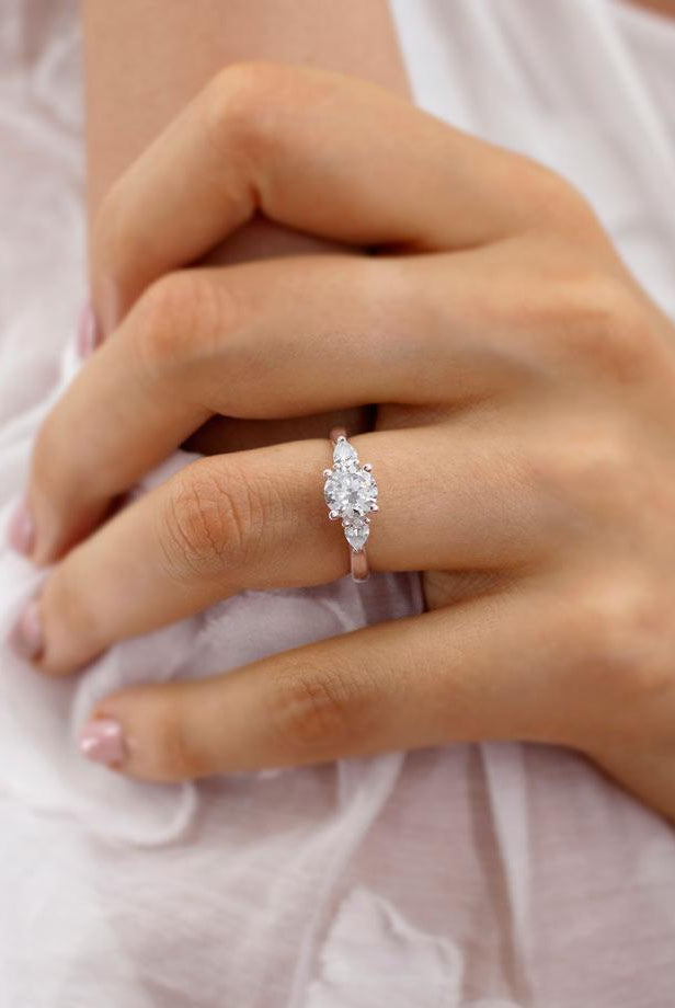 1-0-ct-round-shaped-moissanite-three-stone-engagement-ring-2